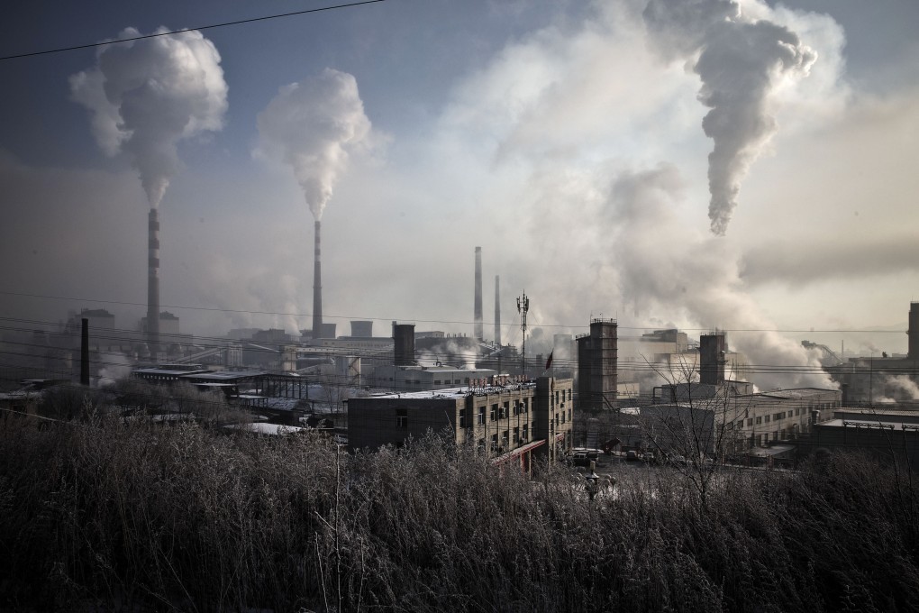 Water vapor and smoke rise from a steel plant in Tonghua, Jilin province, China. Photo: Bloomberg