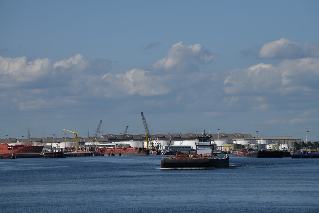 A barge travels through the Houston Ship Channel. Photo: Reuters