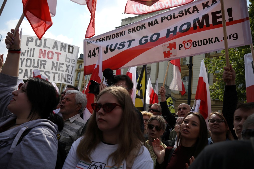 The protest against compensating Jews for property lost during the second world war in Warsaw on Saturday. Photo: Reuters