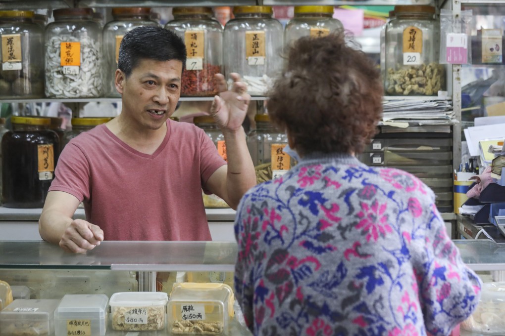 Lau Chiu-kwong, owner of Tung Shing Medicine, is one of hundreds of people who have been trained by the Christian Family Service Centre. Photo: Dickson Lee