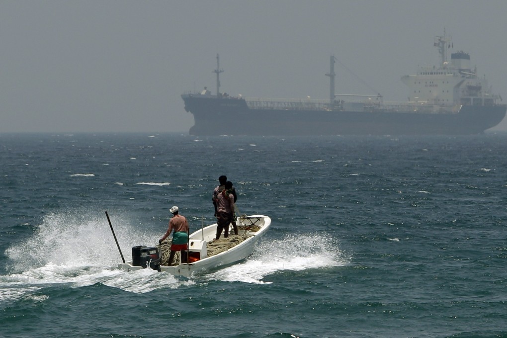 Fishermen cross the sea waters off Fujairah, United Arab Emirates. Photo: AP Photo