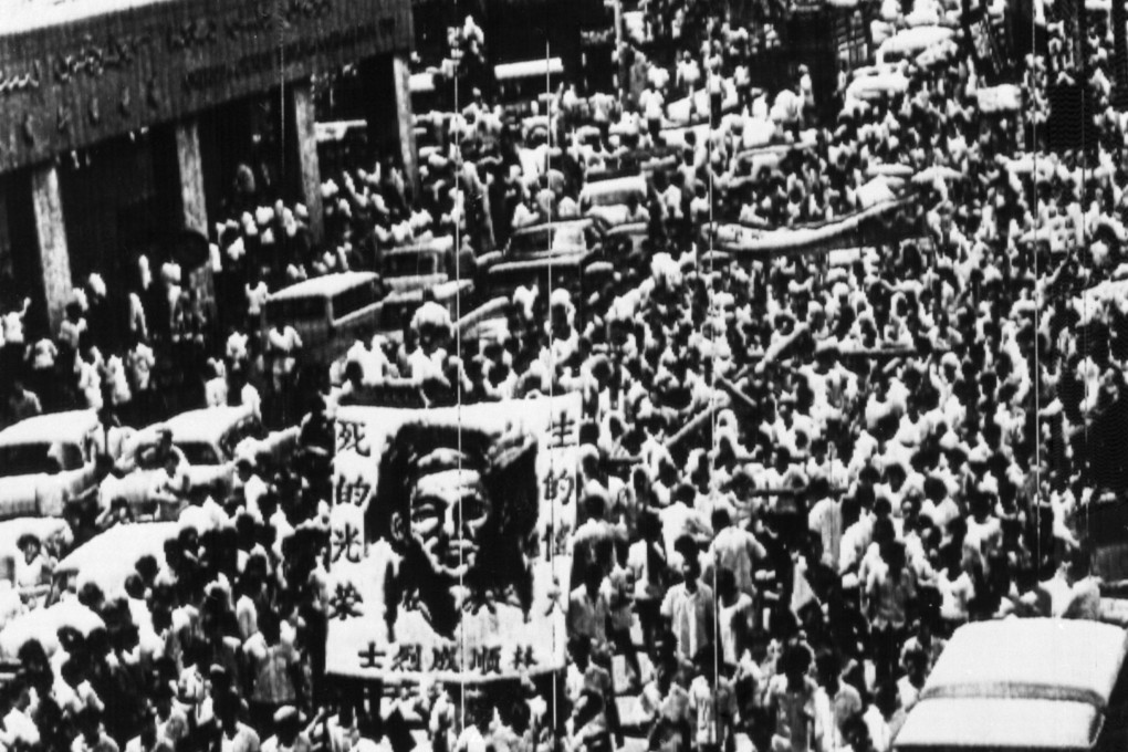 Protesters carry a portrait of slain worker Lim Soon Seng during a 1969 march in Kuala Lumpur. Behind the portrait is Lim’s coffin. He was killed in a clash with police on May 4 that year, fuelling racial tensions. Days later riots erupted. Photo: AP