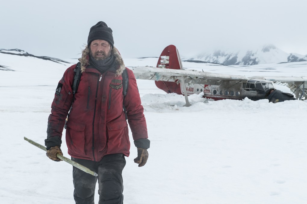 Mads Mikkelsen in a still from Arctic (category IIA), directed by Joe Penna and also starring Maria Thelma Smaradottir.