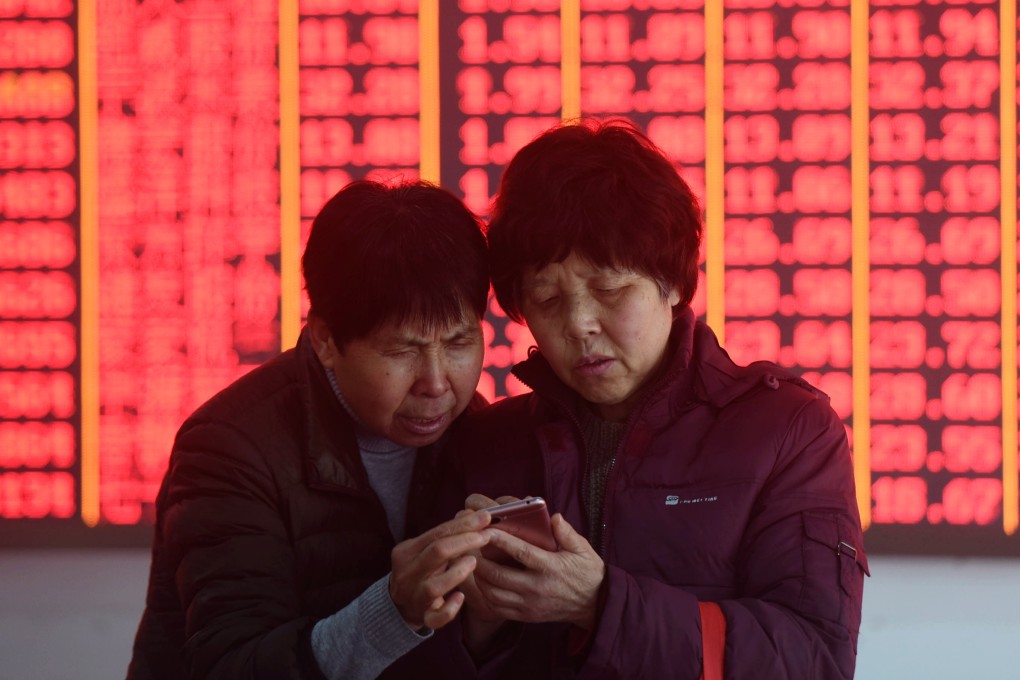 Investors at the Hangzhou stock exchange in east China’s Zhejiang province, ahead of a doubling of mainland-traded shares’ weighting in the MSCI Emerging Markets Index. Photo: Xinhua