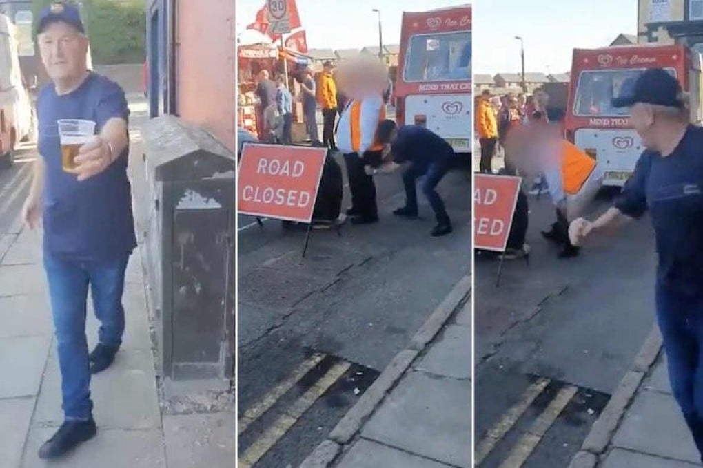 Martin Mullen hands his beer to a friend before pulling a steward’s trousers down. Photo: Twitter