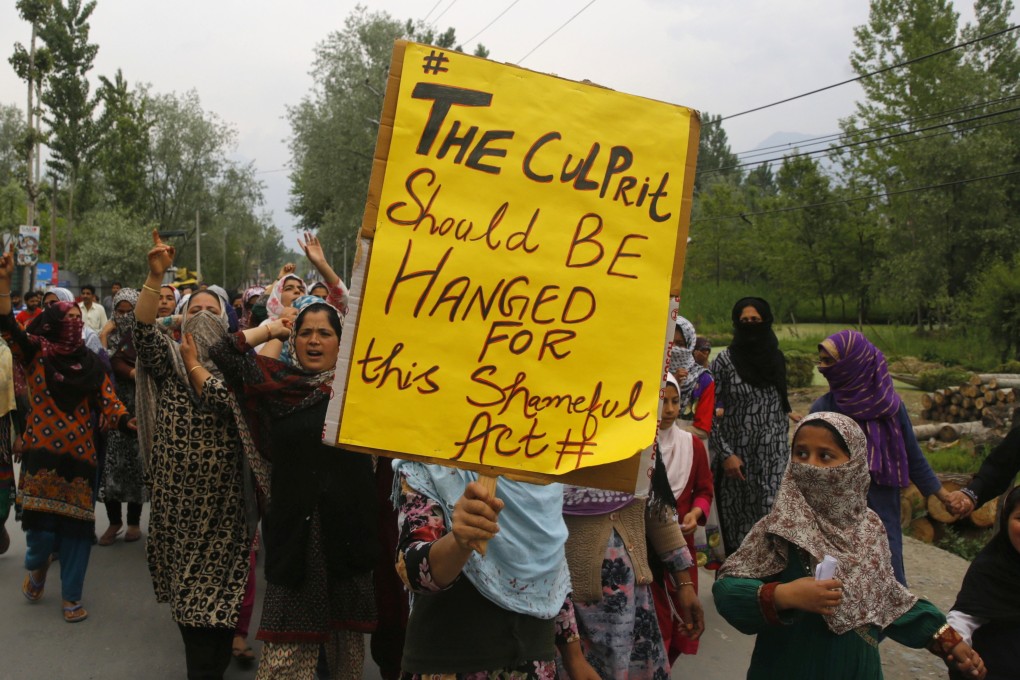 Kashmiri Muslim protesters shout slogans and carry placards in Srinagar. Photo: EPA-EFE