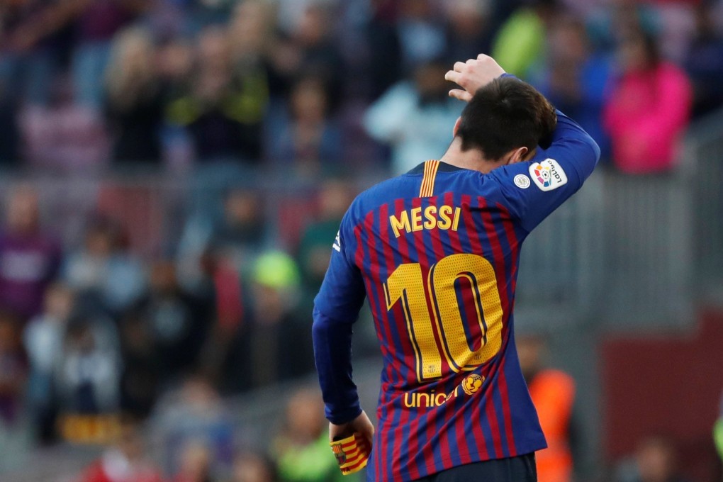 Barcelona’s Lionel Messi leaves the pitch. Photo: Reuters