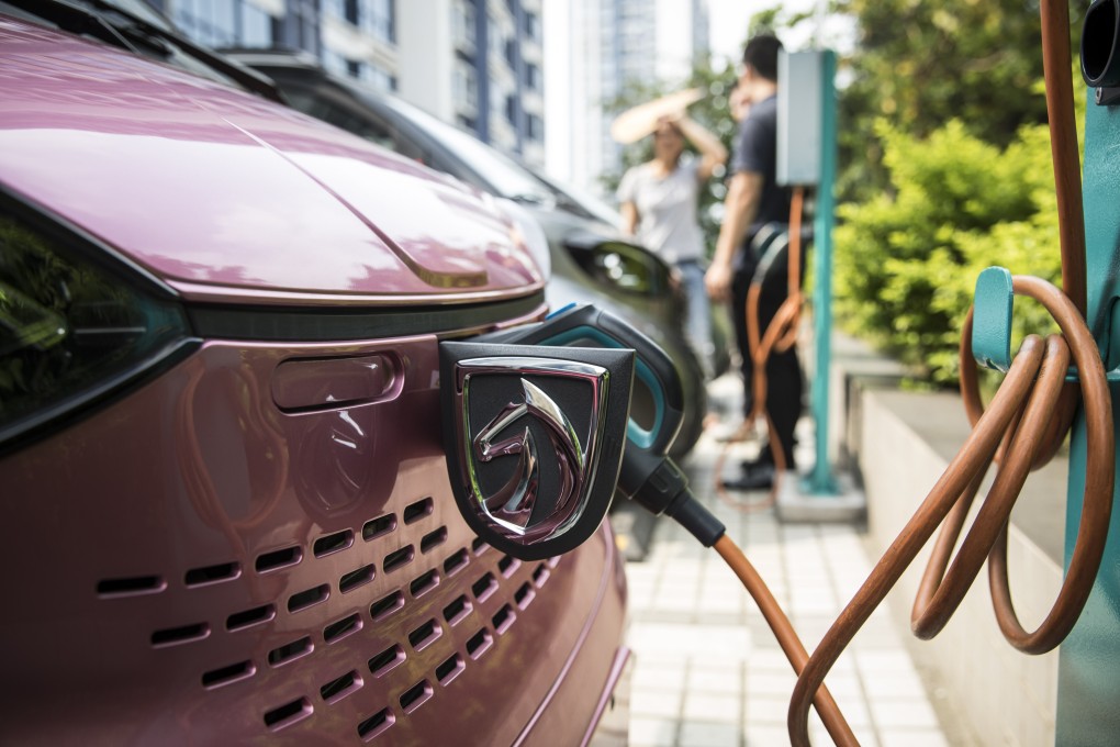 A Baojun E100 electric vehicle (EV) stands plugged in to a charging station outside a charging Centre in Liuzhou, Guangxi province on Wednesday, May 23, 2018. Photo: Bloomberg