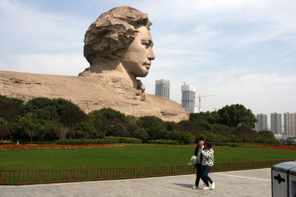 A huge bust of a youthful Mao Zedong on Orange Island in Changsha, China. Photo: Ian Gill