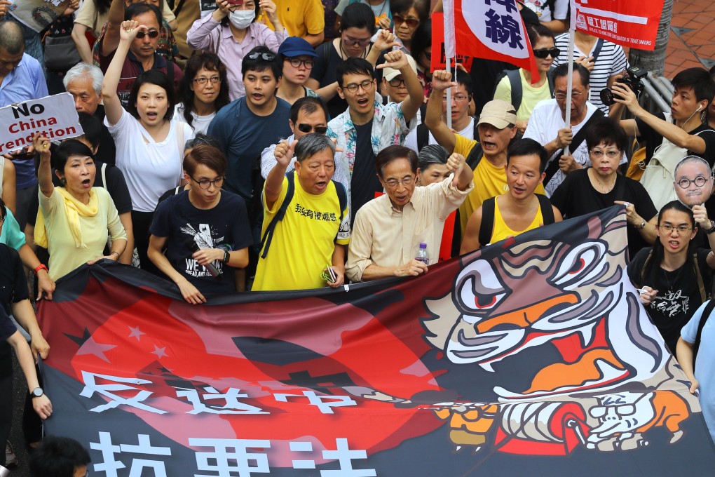 Lee Cheuk-yan, in yellow shirt, and Martin Lee Chu-ming, in beige shirt, at a rally in Hong Kong on April 28 opposing the extradition bill. Both men were part of a delegation testifying in Washington on Wednesday. Photo: Edmond So