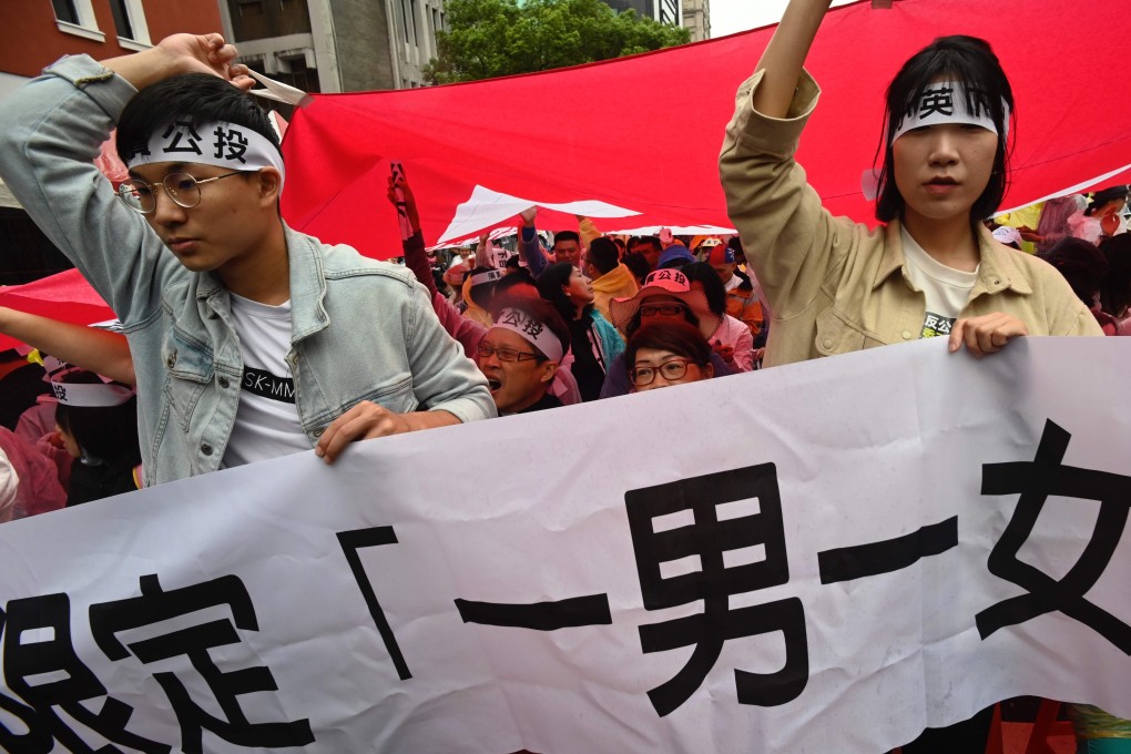 Anti-gay-marriage protesters rally outside the Taiwanese legislature in Taipei on May 8. Lawmakers are expected to vote this Friday on three draft bills that would implement a Constitutional Court ruling in 2017 legalising same-sex marriage. Photo: AFP