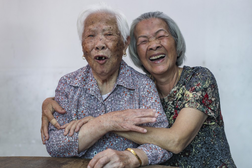 Man Kam-hop, 91, (left) and Leung Siu-ha, who sang bridal laments as they recalled being wed to strangers in arranged marriages in Hong Kong for a documentary. The women are from the Weitou minority that moved to Hong Kong 1,000 years ago. Photo: Xiaomei Chen