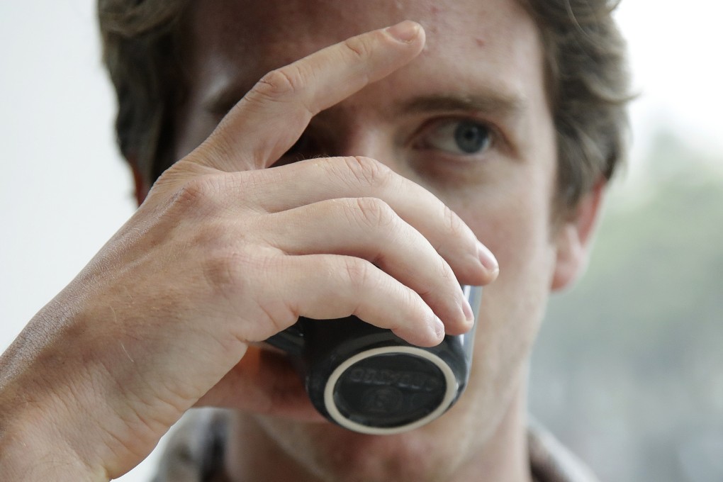 A customer tries the Elida Natural Geisha coffee at Klatch Coffee in San Francisco. Photo: AP