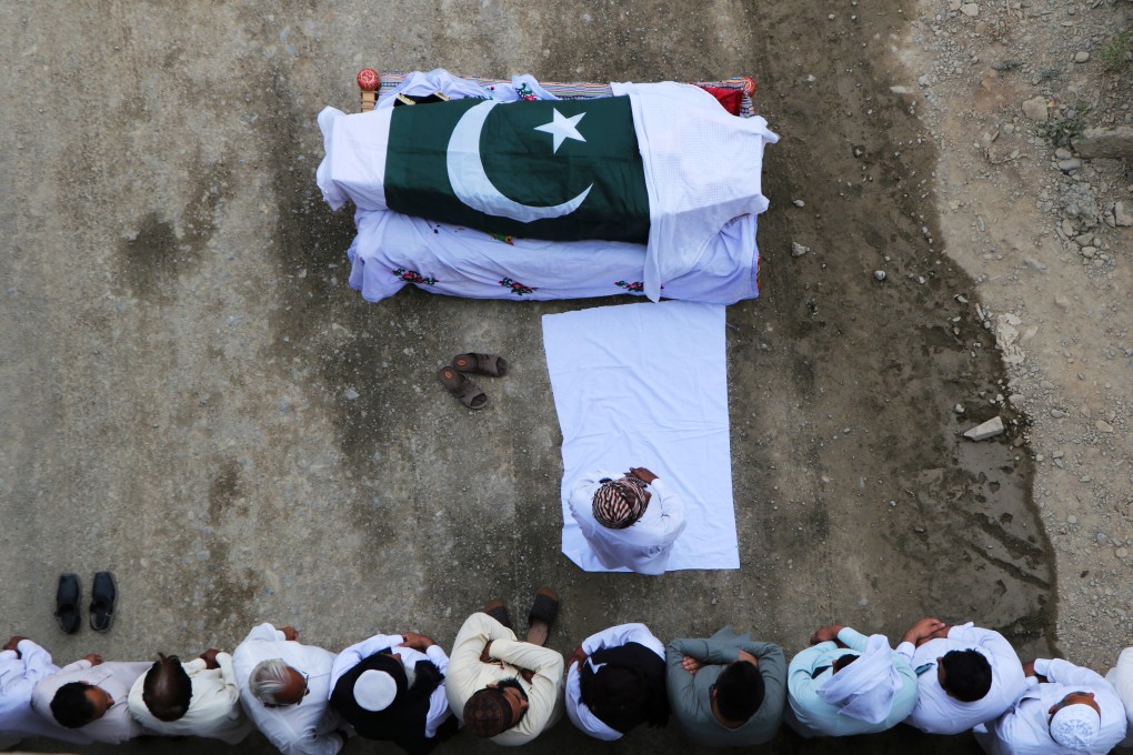 The funeral of Awais Ali Shah, a security supervisor killed after BLA insurgents attacked a luxury hotel in the port city of Gwadar. Photo: Reuters