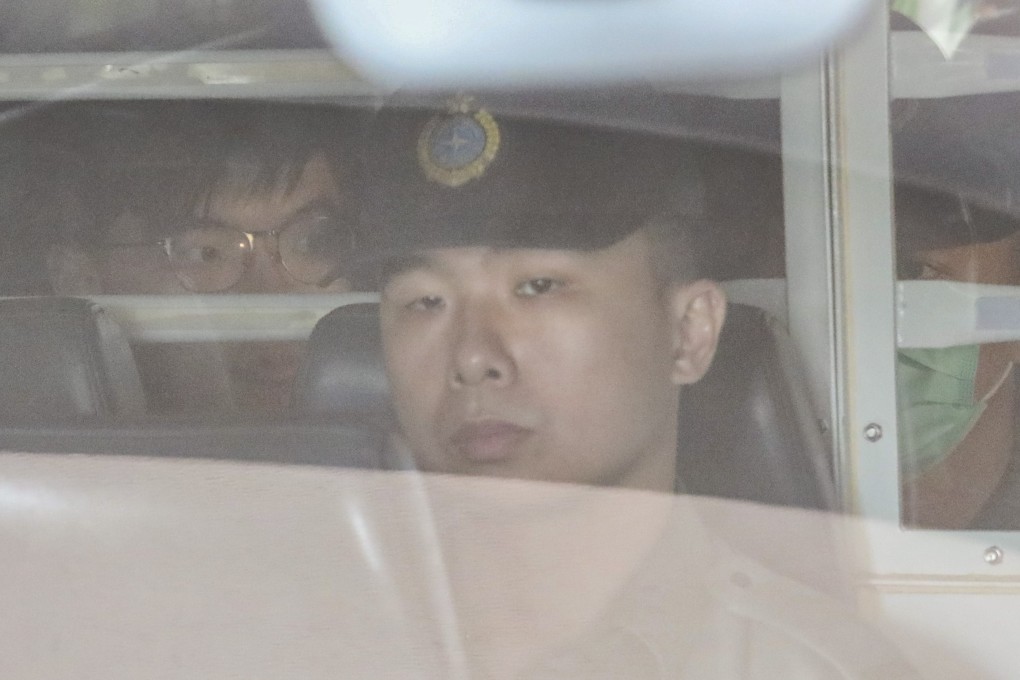 Joshua Wong is escorted from Hong Kong’s High Court after winning an appeal to reduce his prison sentence, then being sent back to jail to serve it. Photo: Felix Wong