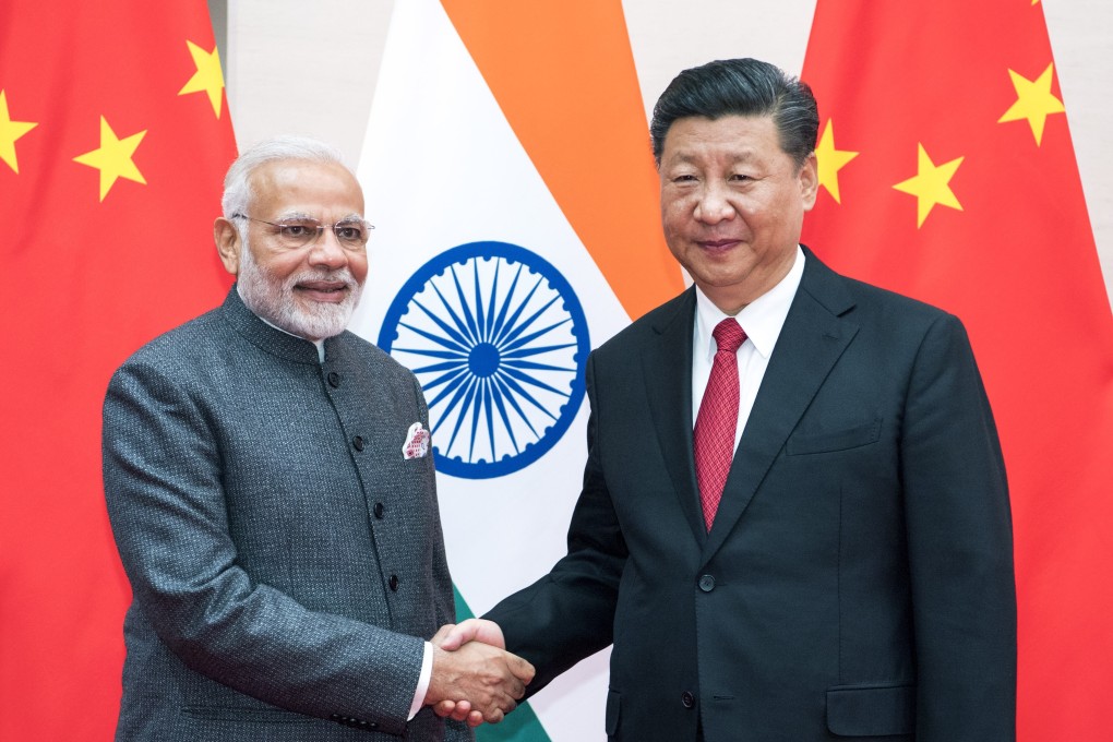 Indian Prime Minister Narendra Modi meets Chinese President Xi Jinping at the Shanghai Cooperation Organisation summit in Qingdao, in east China's Shandong province, on June 9, 2018. Photo: Xinhua