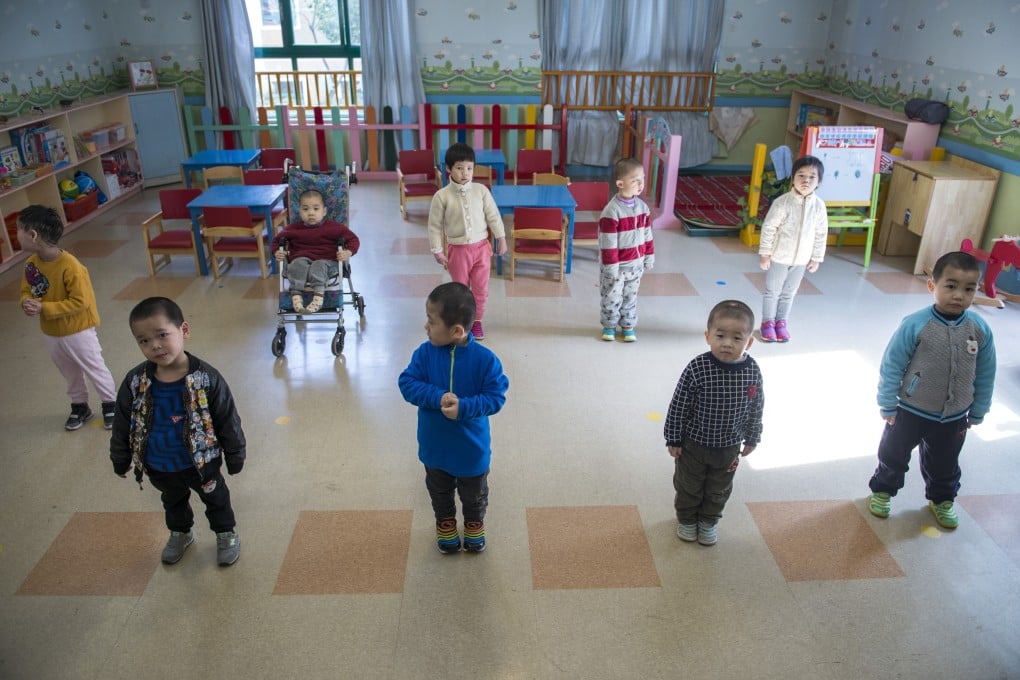 Children with disabilities at the Shanghai Children's Home orphanageWelfare Institute, in China. Photo: Zigor Aldama