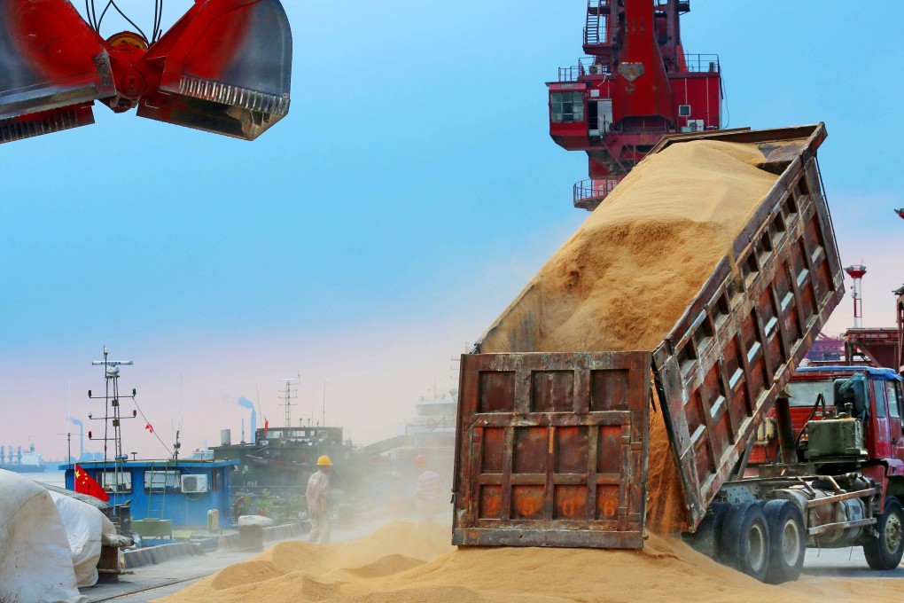 A truck is loaded with soybeans at a farm in Porto Nacional, Brazil. Photo: Reuters