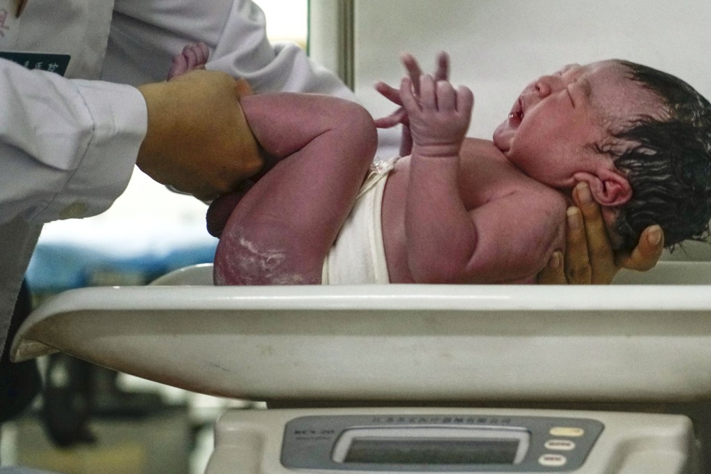 A newborn is weighed at a county hospital in Xiongan New Area, in China’s northern Hebei province. Gender-biased sex selection is often blamed for skewing the sex ratio at birth in China. Photo: Xinhua