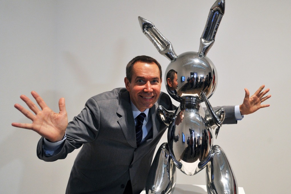 US artist Jeff Koons with his work ‘Rabbit’, which sold this week at auction in New York for a record US$91 million. Photo: EPA
