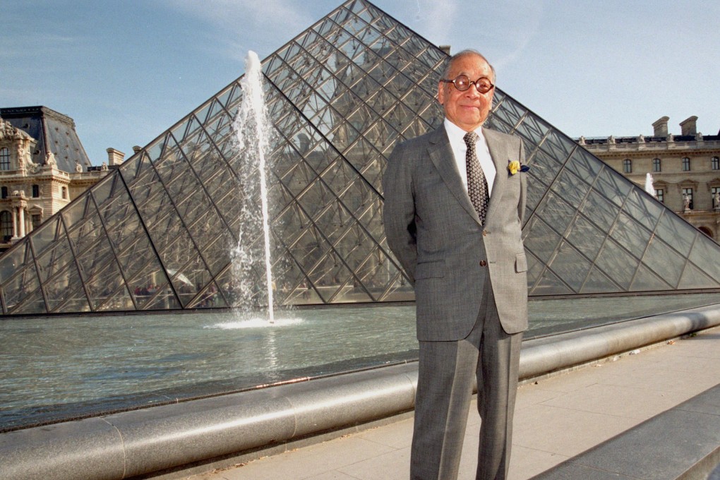 I.M. Pei poses in front of the Louvre Pyramid in 1999. Photo: AP