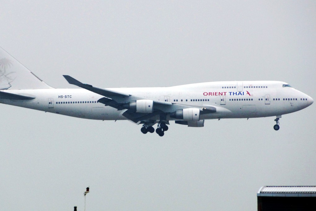 An Orient Thai 747 lands at Hong Kong International Airport. Photo: Dennis Ho