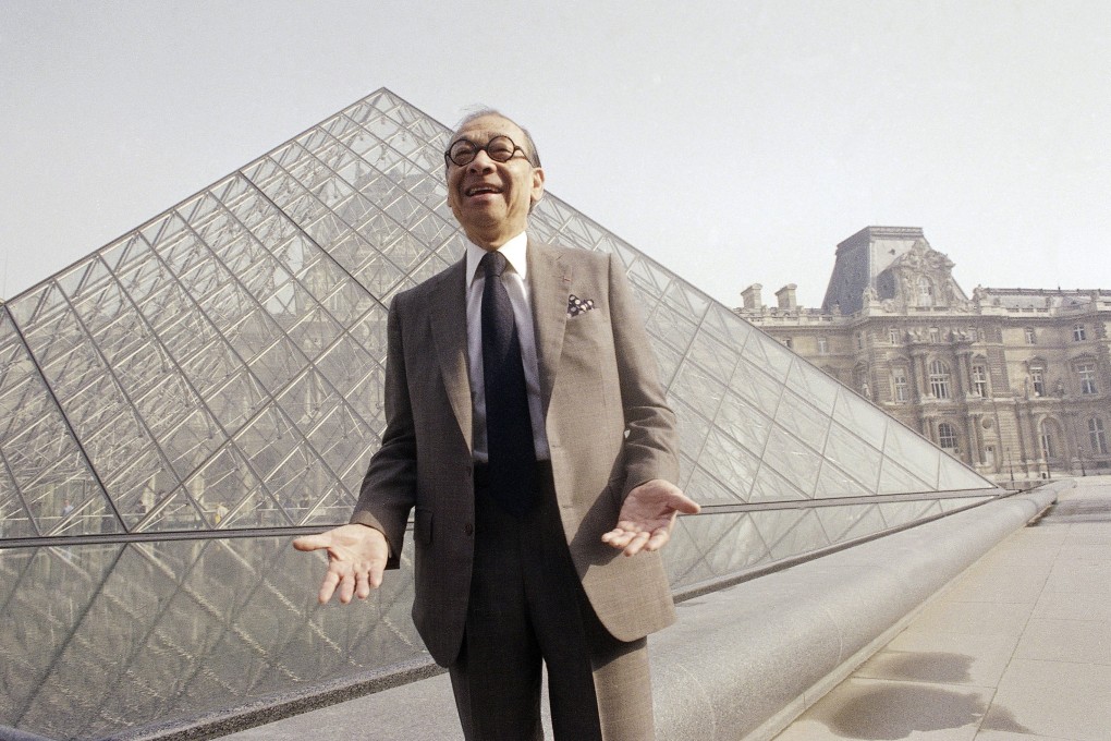 Chinese-American architect I.M. Pei in front of the Louvre glass pyramid, which he designed. He died on Thursday, aged 102. Photo: AP