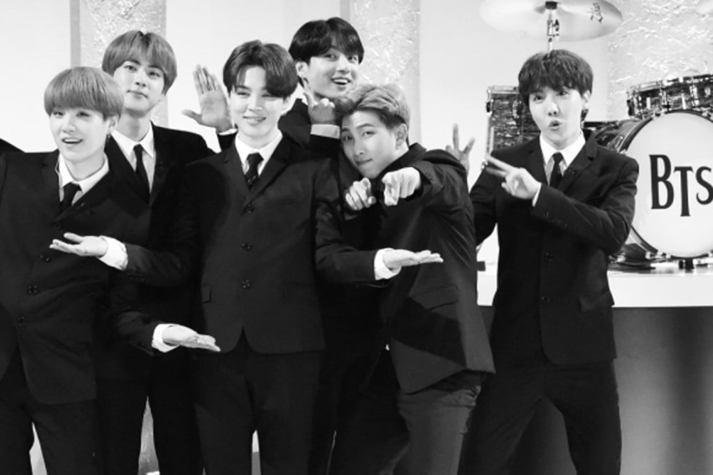 BTS on The Late Show with Stephen Colbert dressed like The Beatles for a performance of their song Boy with Luv.