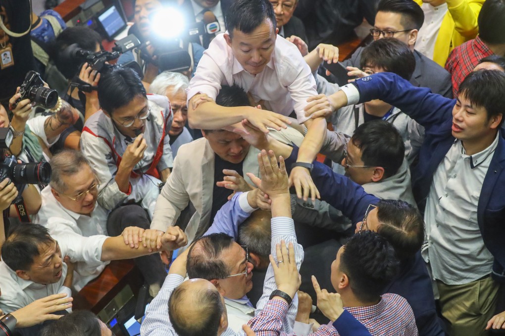 Hong Kong’s Legco descends into chaos as lawmakers scuffle over a contentious extradition bill. Photo: Edmond So