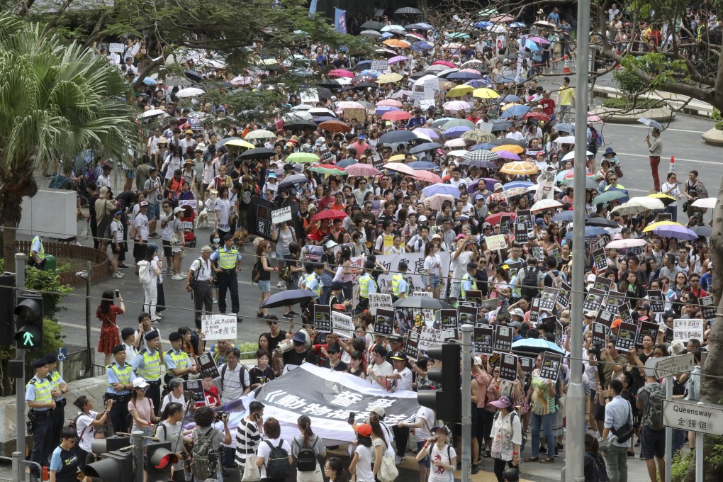 Protesters marched in scorching temperatures from Chater Garden to government headquarters. Photo: K.Y. Cheng