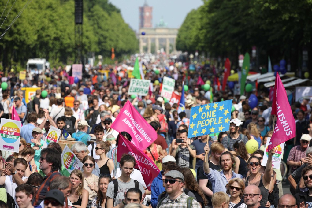 People take part in the pro-Europe demonstration “One Europe for all- your voice against nationalism” a week before European elections in Berlin. Photo: AFP