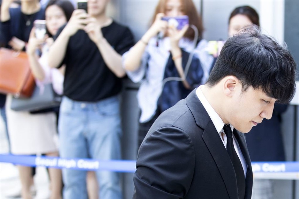 K-pop star Seungri walks into Seoul Central District Court in South Korea to attend a hearing on his arrest warrant last Tuesday. Authorities said there was not enough evidence to support charges of embezzlement.