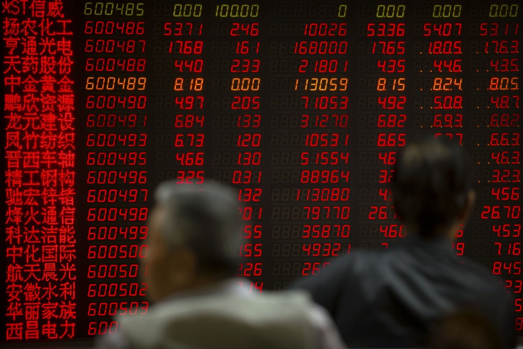 Chinese investors monitor stock prices at a brokerage house in Beijing on May 10, 2019. Photo Associated Press