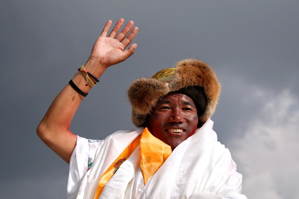 All in a week’s work: Kami Rita Sherpa guides people up mountains for a living. Photo: Reuters