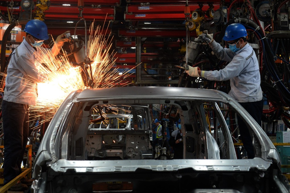 Workers at a car plant in Vietnam, where competitive costs are attracting manufacturers and where, US President Donald Trump says, investors in China are now looking. Photo: AFP