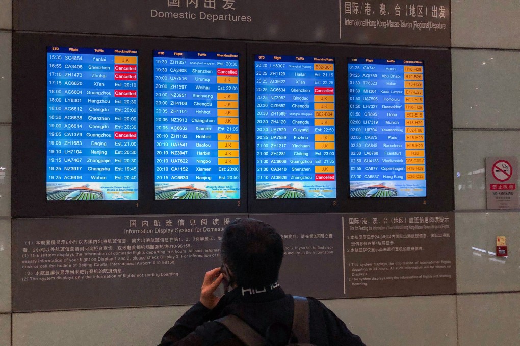 An electronic board at Beijing airport displays cancelled flights. Photo: SCMP