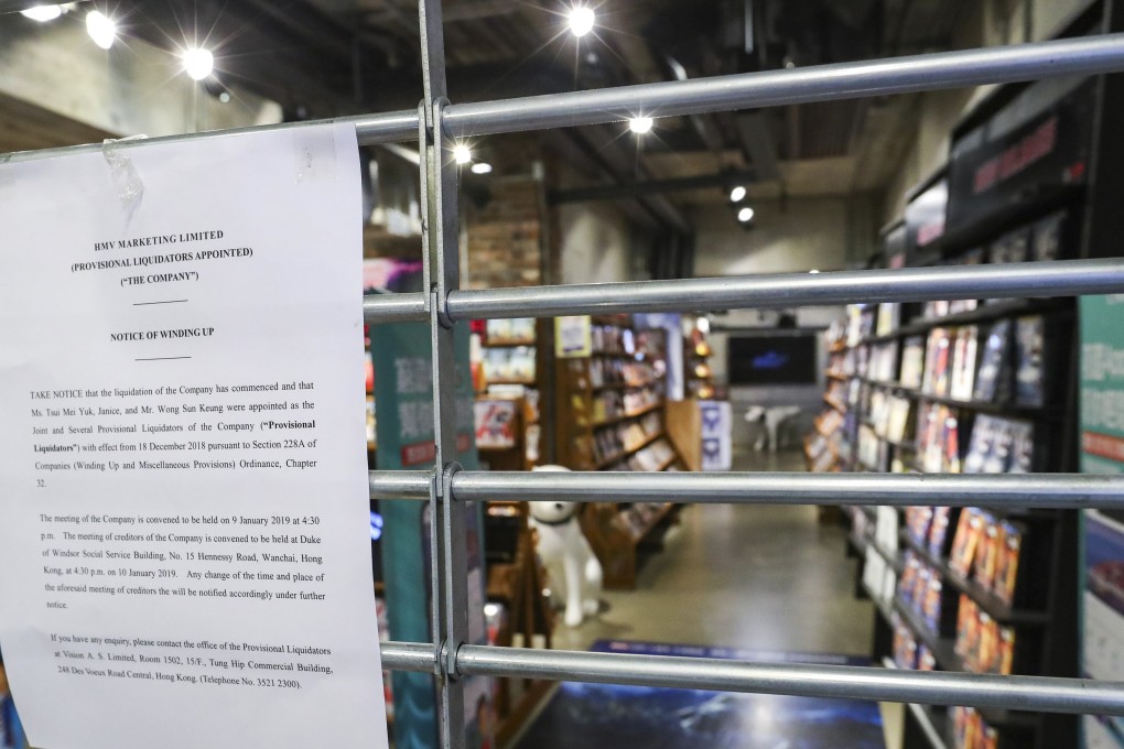 The closed HMV store in Causeway Bay with a wind-up notice on the gate. The shops have suffered years of decline as consumers turned to digital channels to buy music. Photo: Edmond So