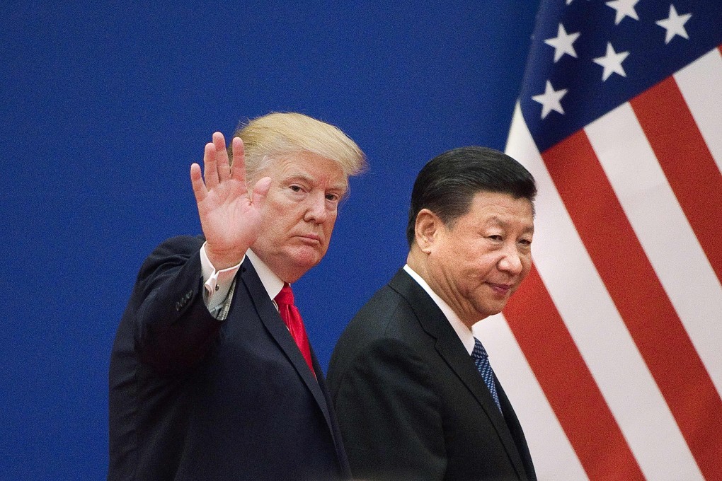 US President Donald Trump and Chinese President Xi Jinping leave an event for business leaders at the Great Hall of the People in Beijing on November 9, 2017. Photo: AFP