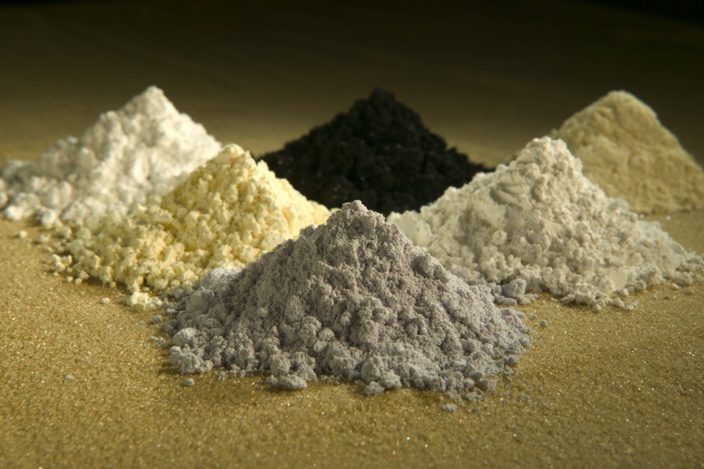 Rare-earth oxides, clockwise from top centre: Praseodymium, cerium, lanthanum, neodymium, samarium, and gadolinium. Photo: AP/US Department of Agriculture