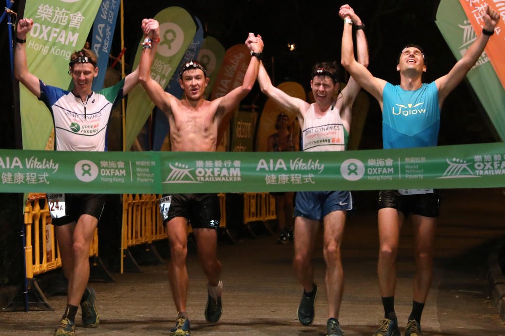 Team Gone Running-Joint Dynamics – (from left) Brian McFlynn, John Ellis, Jeff Campbell, and Michael Skobierski – rely on ice to win the Oxfam Trailwalker. Photo: Felix Wong