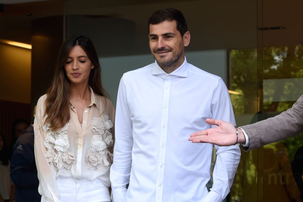 Porto’s Spanish goalkeeper Iker Casillas leaves a hospital with his wife Sara Carbonero in Porto on May 6, 2019 after recovering from a heart attack. Photo: AFP