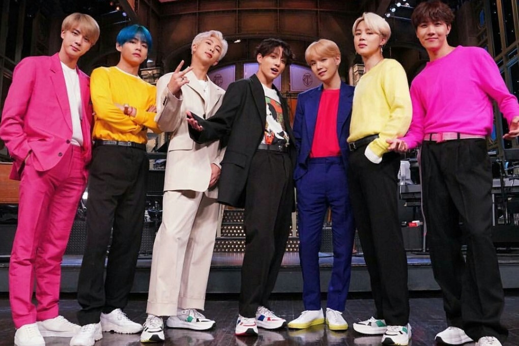 BTS wear Juun.J sneakers on Saturday Night Live. The K-pop stars have retailers lining up to sponsor them in the hope of their success rubbing off.