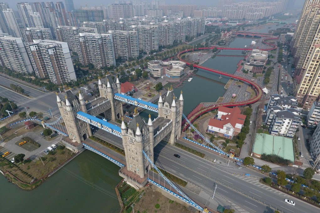 A bridge modelled on London's Tower Bridge in Suzhou, in China's eastern Jiangsu province. New home prices rose in 67 out of the 70 cities monitored by China’s National Bureau of Statistics in April. This prompted the housing ministry to warn four cities, including Suzhou, that they were showing signs of overheating. Photo: AFP