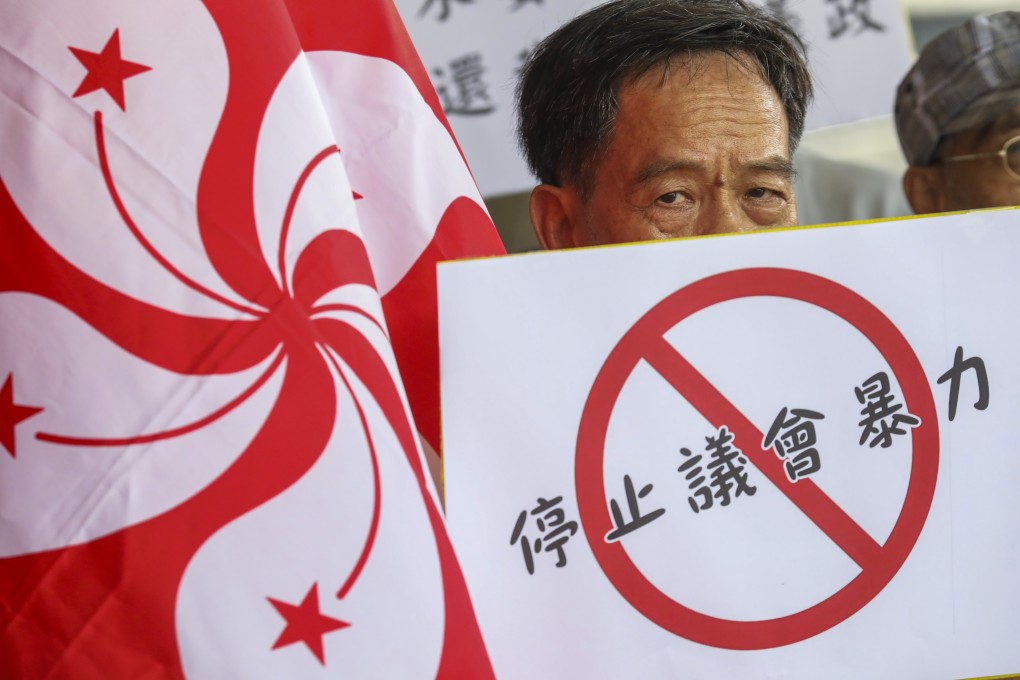Activists protest against the government’s proposed changes to Hong Kong’s extradition law outside the Legislative Council Complex in Tamar on May 17. Photo: Dickson Lee