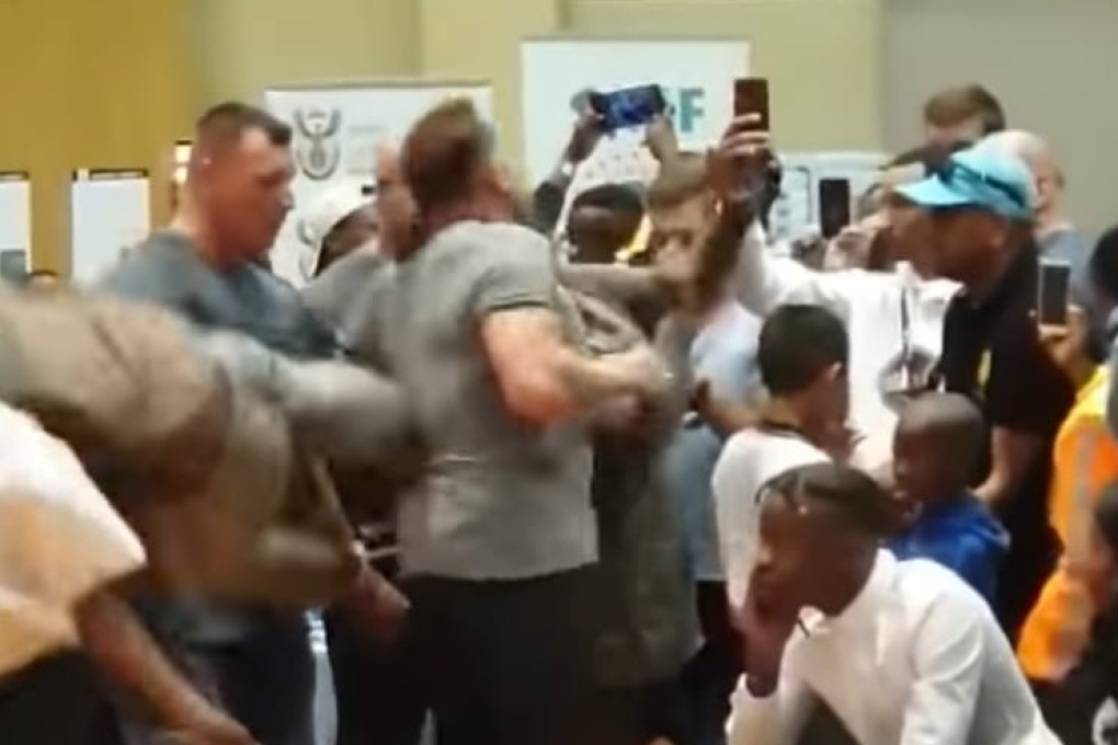 Arnold Schwarzenegger is attacked by a deranged fan in South Africa. Photo: You Tube