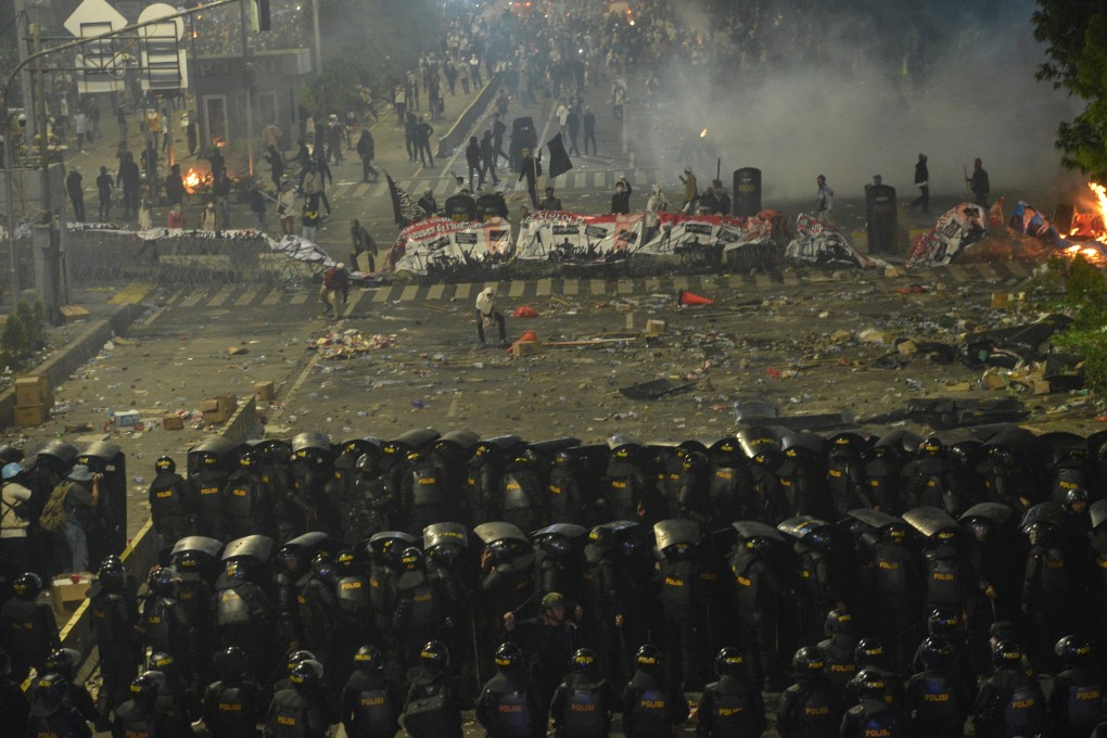 Protesters clash with police in Jakarta. Photo: Reuters