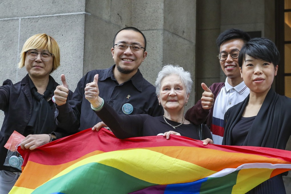 LGBT equality advocates show their support for a gay Hong Kong immigration officer who is seeking spousal benefits for his partner whom he married in New Zealand. Photo: Nora Tam