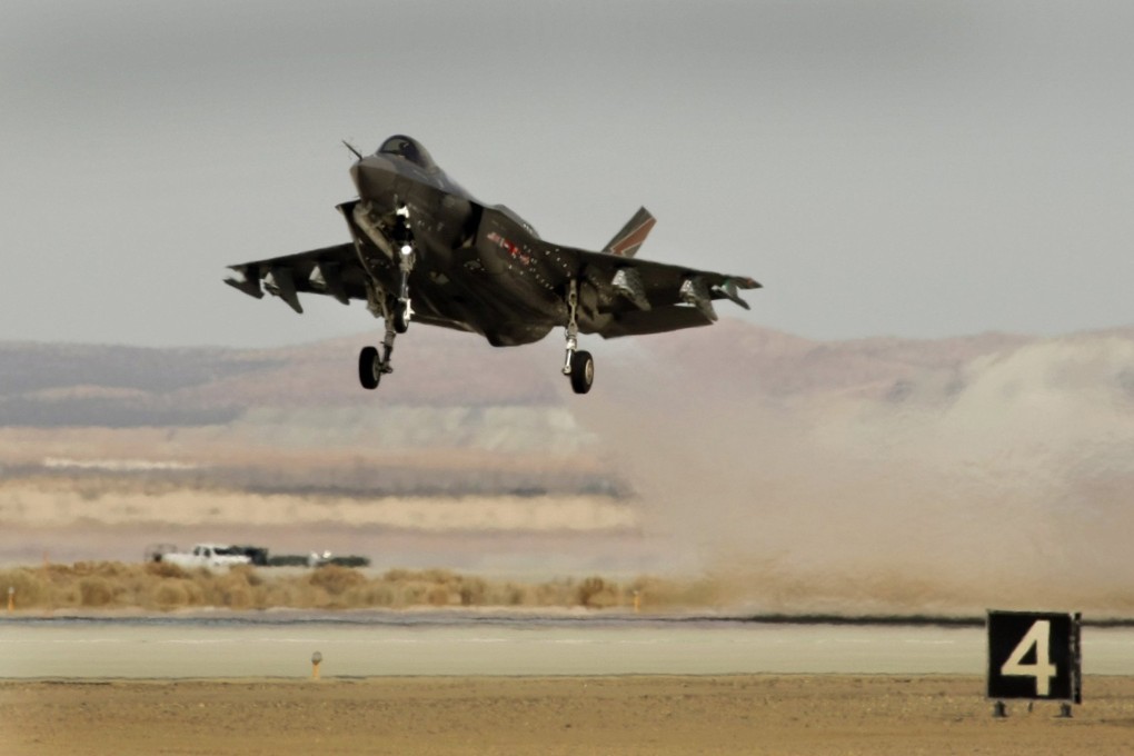 A Lockheed Martin F-35 Lightning II lifts off during testing at Edwards Air Force Base in March 2013. Photo: Los Angeles Times via TNS