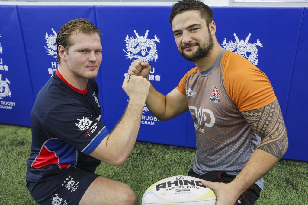 Alex Post and Josh Dowsing are good buddies off the field, but said there will be little love lost tomorrow in a friendly scrimmage. Photo: K.Y. Cheng
