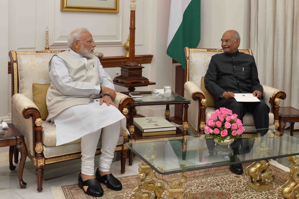 Indian Prime Minister Narendra Modi (left) meets with President Ram Nath Kovind at Rashtrapati Bhavan in New Delhi. Photo: Indian Presidency handout via AFP